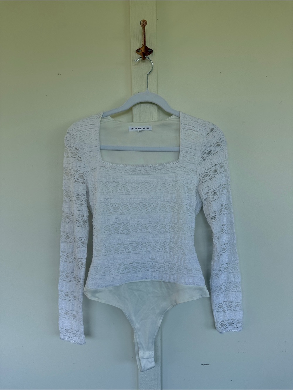 Celebrity pink lace bodysuit
